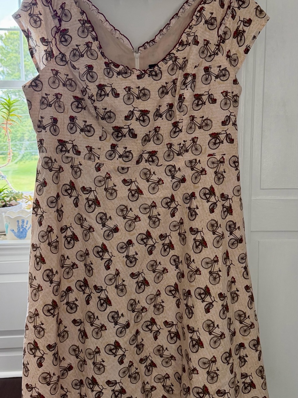 Retrolicious Cream Dress with Black Bicycle Print and Red Accents